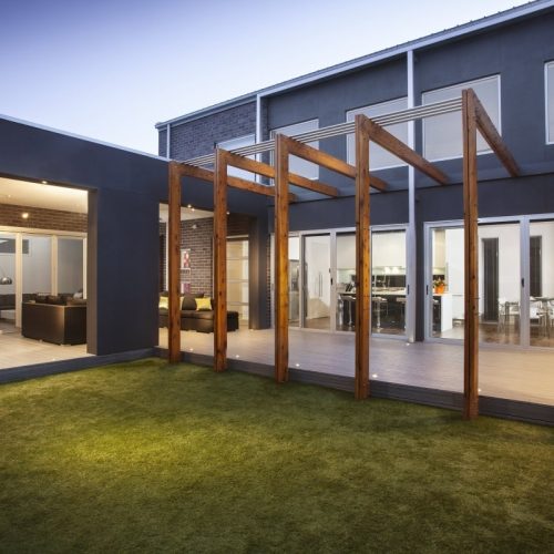 Sliding glass doors provide natural light, ventilation, security, and seamless indoor-outdoor access.